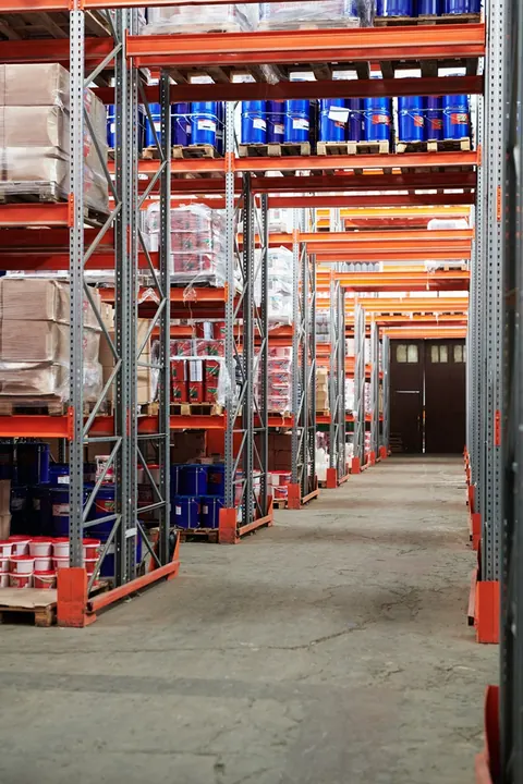 Warehouse aisle with stored goods