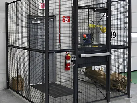 Driver access cage at a shipping area